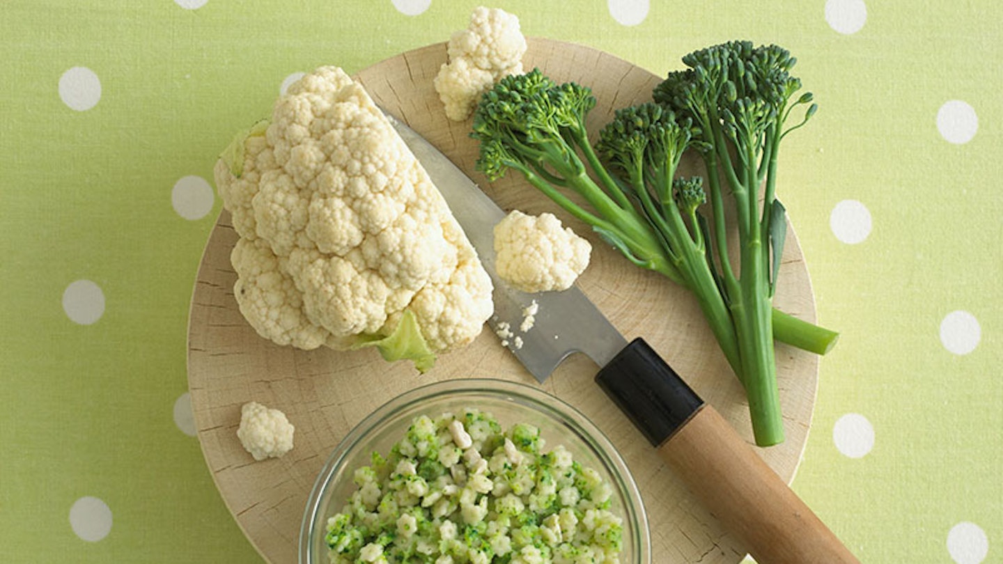 cauliflower and broccoli on a chopping board