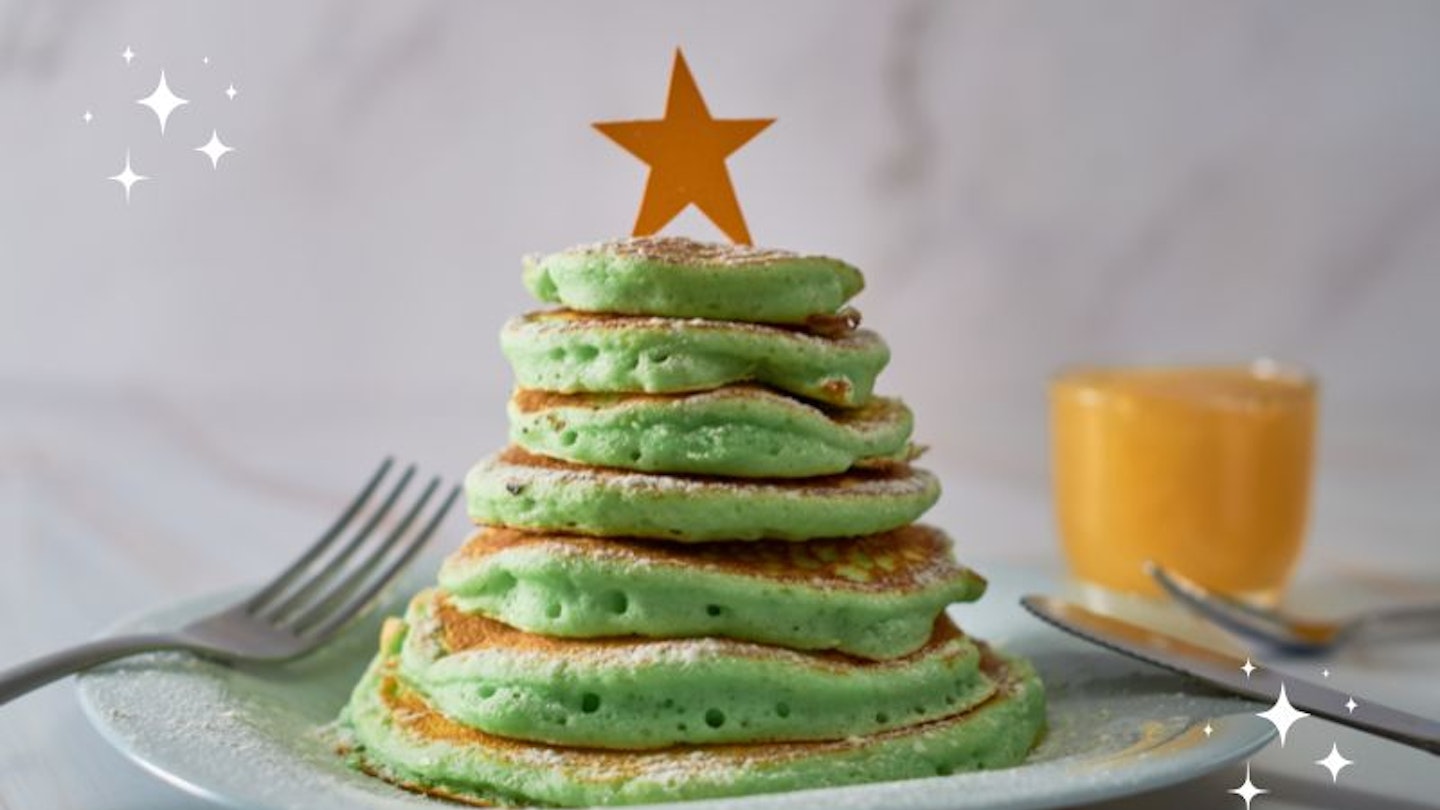 A stack of Christmas themed pancakes to make a christmas tree