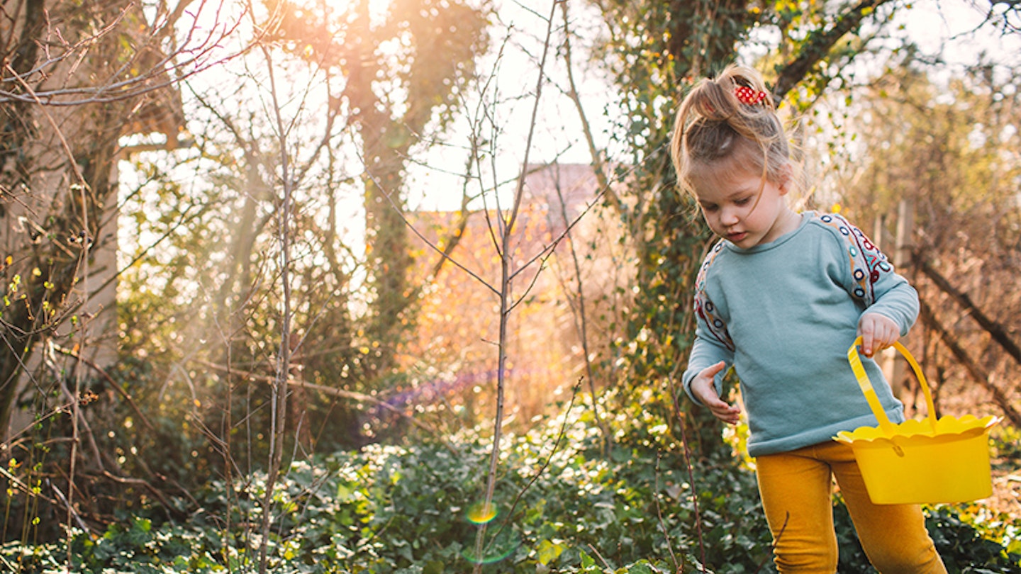 Toddler on Easter egg hunt