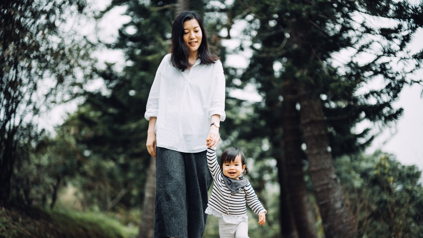 mum walking with baby