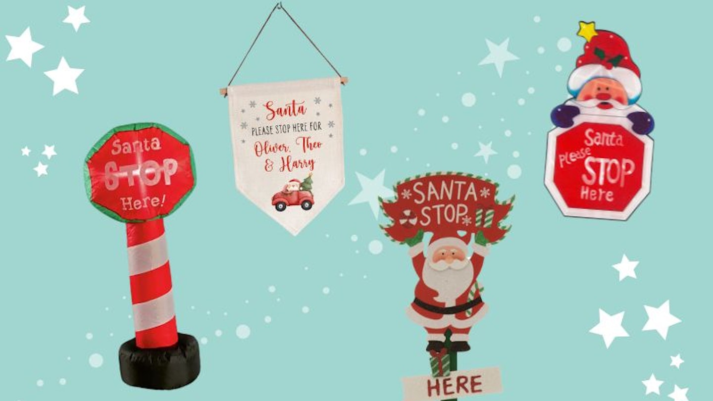 Santa stop here signs on a blue green background