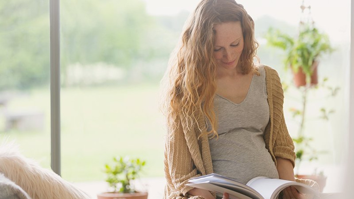 pregnant woman reading