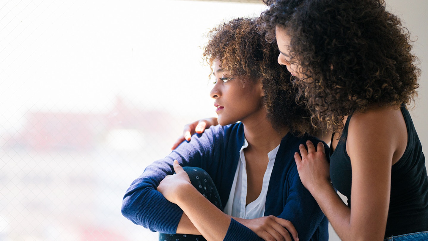 Woman supporting friend