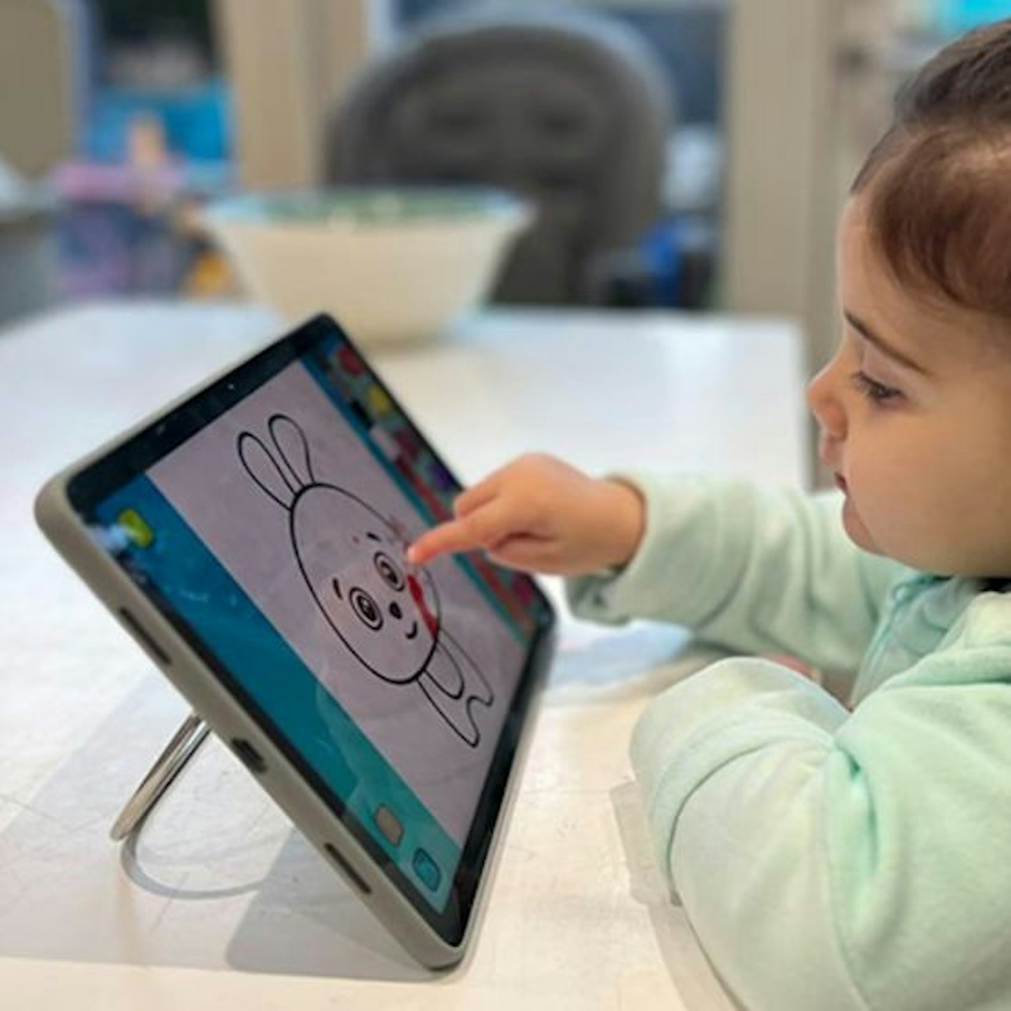 Young child doing a drawing on the Google Pixel Tablet